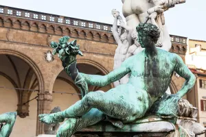 : statue of fountain of neptune close up travel to Italy - statue of fountain of neptune close up in Florence city