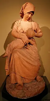 Carved Prints: Statue of a peasant woman nursing a baby by Jules Dalou (1838-1902) a French sculptor