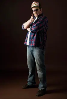 Toughness Prints: Stereotypical American Man posing and making the bang bang hand greeting
