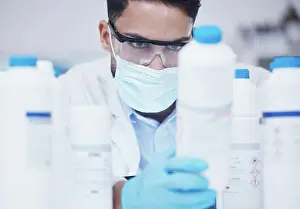 Manufacturing Prints: Stock check, chemical bottle and man scientist with mask at pharmaceutical lab working