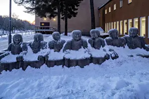 Sports Facility Prints: Stockholm, Sweden Exterior limestone statues of world figures at the Vastertorp sports facility in the snow