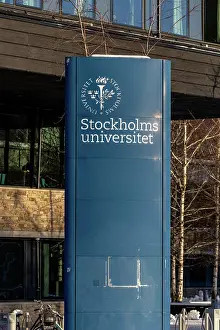 Campus Prints: Stockholm, Sweden An exterior sign in Swedish for the Stockholm University in wintertime in the snow