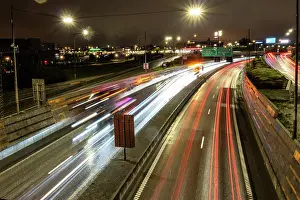 Lane Prints: Stockholm, Sweden Traffic at night on the Essingeleden highway and directional signs