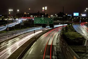 Swedish Prints: Stockholm, Sweden Traffic at night on the Essingeleden highway and directional signs
