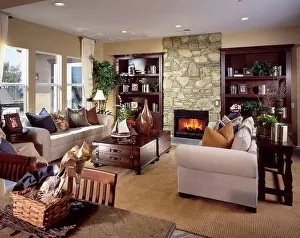 Coffee Table Prints: Stone wall with fireplace with in living room. 06/01/2006
