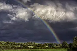 Pasture Prints: Stormclouds and rainbow over pasture, Brecon Beacons N.P. Mid Wales, October