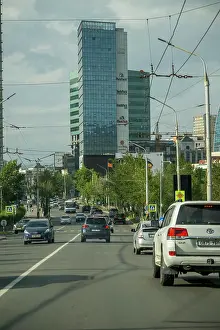 Capital Cities Prints: Street scene with traffic in the center of Ulaanbaatar, the capital city of Mongolia