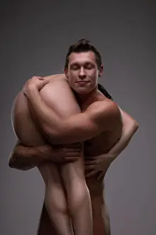 Fondness Prints: Strong man carrying naked woman on shoulder Muscular male with closed eyes smiling