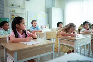 Freude Prints: Students learn and study in a classroom of school where youngsters sit and listen attentively
