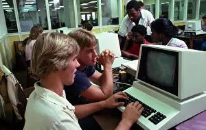 Typing Prints: Students using computers in classroom