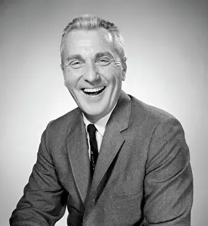 Shirt And Tie Prints: Studio portrait of businessman laughing