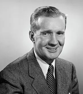 Shirt And Tie Prints: Studio portrait of businessman smiling
