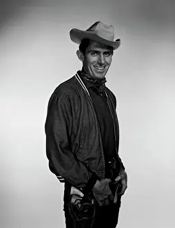 One Mid Adult Man Only Prints: Studio portrait of cowboy