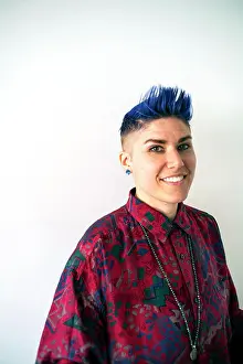 Cheerful Prints: Studio portrait of smiling non-binary person