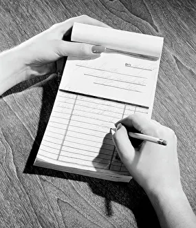 Pencil Prints: Studio shot of woman preparing to do list