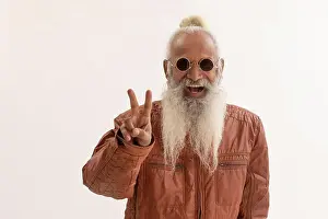 Exhilaration Prints: A STYLISH OLD MAN HAPPILY GESTURING AT CAMERA