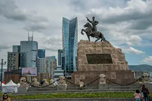 2023 Prints: The Sukhbaatar statue on the Sukhbaatar Square or Genghis Khan Square also called Chingis Khan Square with modern