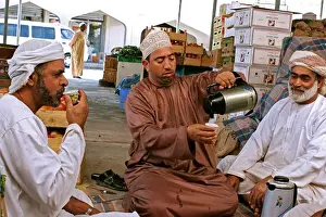 Cafe Prints: Sultanate Oman men drink coffee in the Souq of Rustaq, Local people drinking coffe