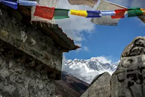 Hike Prints: The summit of Mount Everest seen past prayer flags in Tengboche, Nepal