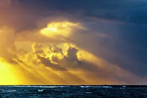 Greece Prints: Sun rays from the sky over the sea at sunset