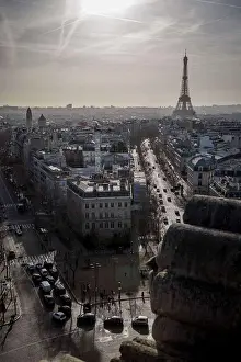 Holidays Prints: The sun rises behind the Eiffel Tower in Paris, France near New Years