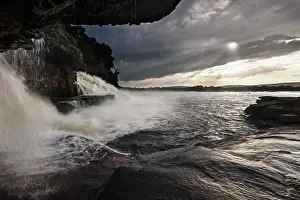 Cloudscape Prints: Sun shining through clouds seen from waterfall, Bolivar State, Venezuela