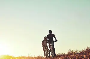 Bicycle Prints: Sunset sky, people and friends on bicycle with workout