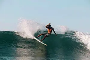 Agility Prints: Surfer on a wave at sunny day