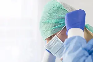 Doctors Prints: Surgeon doctor in sterile gloves preparing for operation in hospital