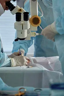 Team Work Prints: Surgeons performing eye surgery on patient at hospital