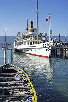 Urban Environment Prints: Swiss historic Belle Epoque paddle steamboat Savoie in the old port at Yvoire along Lake Geneva