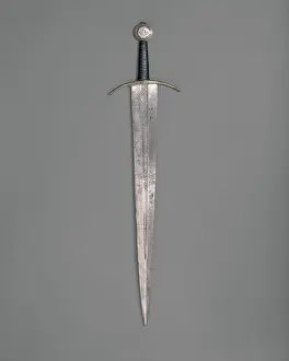 Blade Prints: Sword ca. 1400 Western European The silver-embellished pommel and the crossguard made of copper alloy