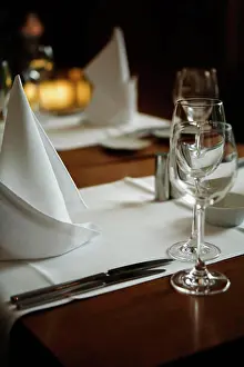 Knife Prints: A table set for dinner in a restaurant