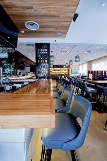 Incidental People Prints: Tables and chairs in modern bar and restaurant