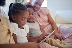 Tablet, girl child and ebook in living room on weekend for live streaming or storytelling for mom and dad