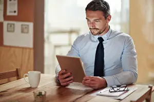 Recruitment Prints: Tablet, reading and businessman in office with email for online CV review for recruitment