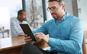 Analysis Prints: Tablet, reading and businessman in office with research online for finance stock market investment