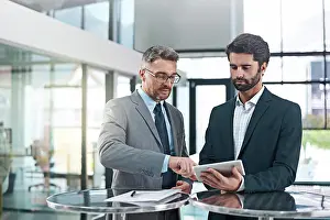 Financial Prints: Tablet, teamwork or business men in meeting for project