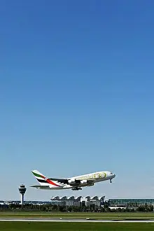 Taking Off Prints: Take-off Emirates Airlines special livery 50th anniversary of the UAE United Arab Emirates Airbus A380-800 with tower