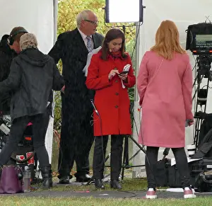 Prepares Prints: Tamara Cohen (red coat) a Sky News political correspondent prepares for interviews on College Green