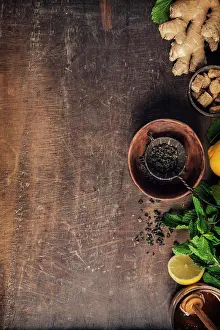 Beverage Prints: Tea composition on rustic background: tea, mint, lemon, ginger. Flat lay top view
