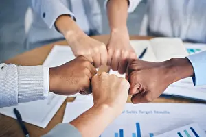 Global Prints: Team, business and hands in fist bump motivation for diversity