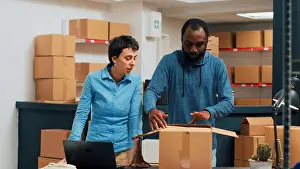 Logistics Prints: Team of owners doing highfive gesture after preparing storehouse order