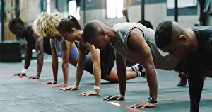Builder Prints: Teamwork, fitness and people do push up in gym for training
