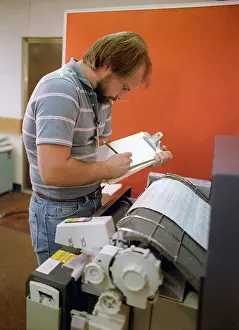 Archives Prints: A technician monitors a computer printout while testing the electrical circuits of an MGM-118 Peacekeeper (formerly MX)