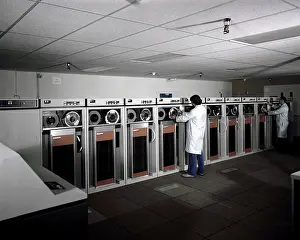 Archives Prints: Technicians check the tape drivers on the new UNIVAC 1100/83 computer at the Fleet Analysis Center