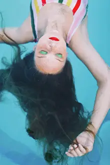 Redhead Prints: Teen Girl Having Fun In The Swimming Pool