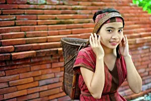 Ceremony Prints: Teen girl wearing a Khmu country side traditional dress in Laos. Name: Anna Saksena