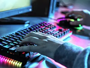 Hobbies Prints: Teenage boy (16-17) using keyboard and mouse