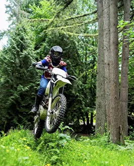 Motorized Prints: A teenage boy riding a motorbike